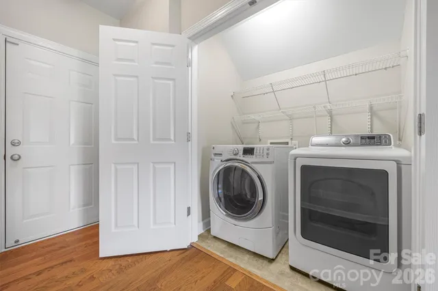 a utility room with dryer and washer