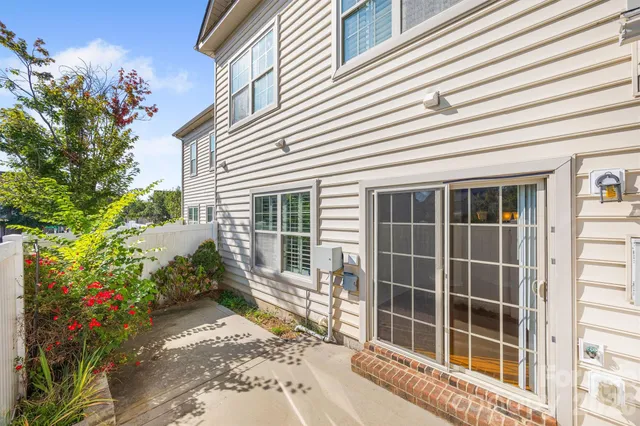 a house with a potted plant on it