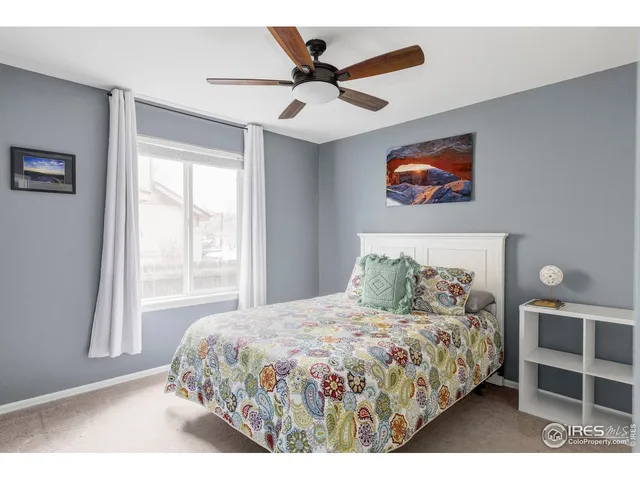 a bathroom with a tub shower and sink