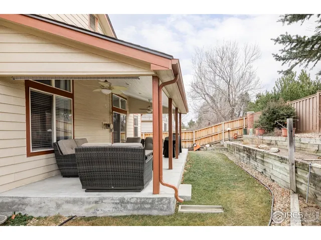 a view of swimming pool with outdoor seating