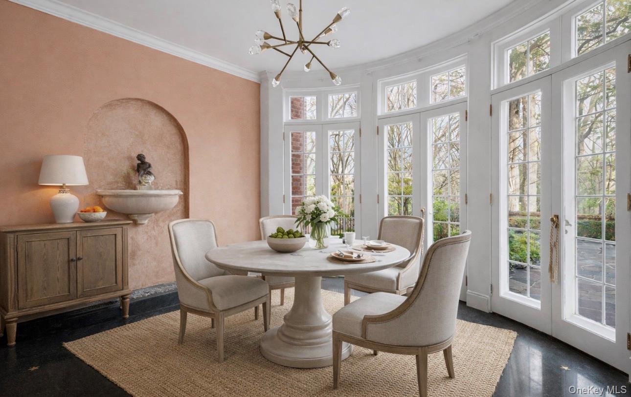 393 Mill River Road Muttontown, NY 11771 - Photo 8 of 41 a view of a dining room with furniture window and wooden floor