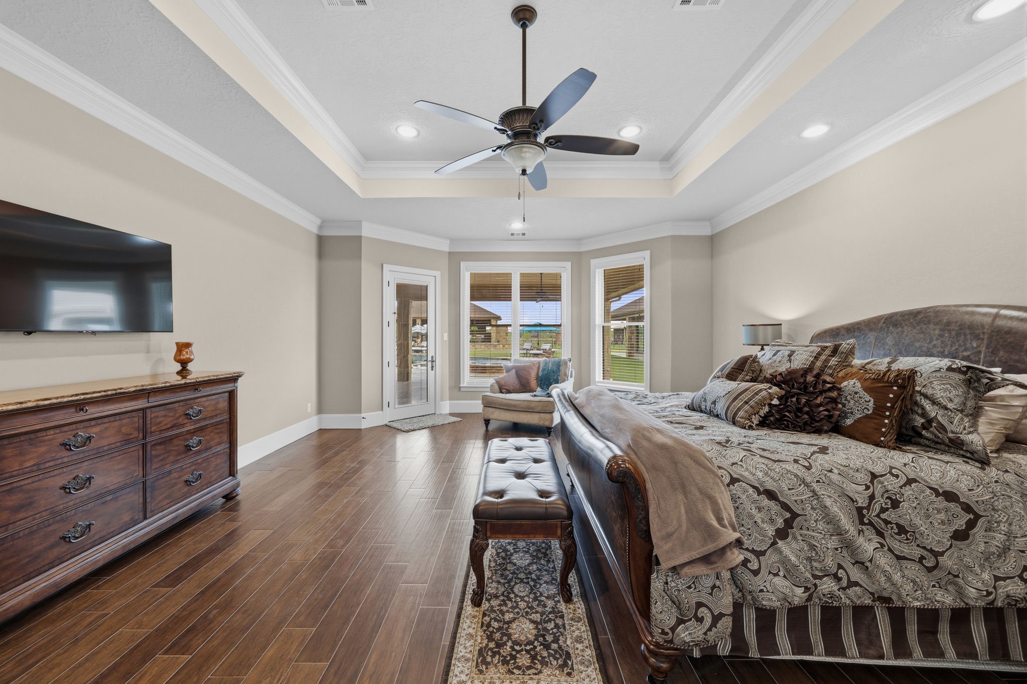 21620 Schiel Road Cypress, TX 77433 - Photo 20 of 49 The owner's suite is expansive and private, overlooking the pool.