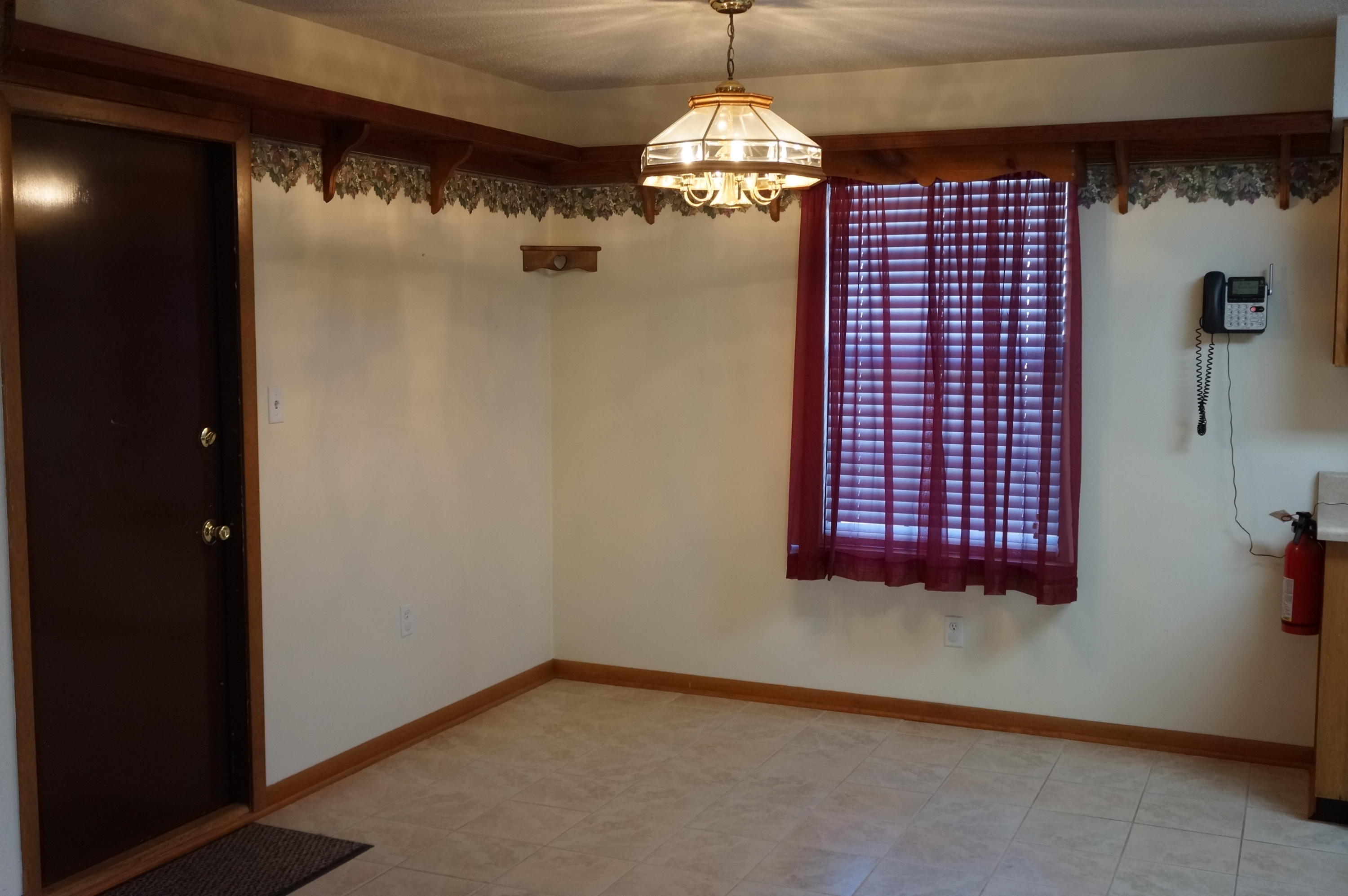 3115 Auburn Road Crestview, FL 32539 - Photo 4 of 25 a view of a livingroom with a chandelier