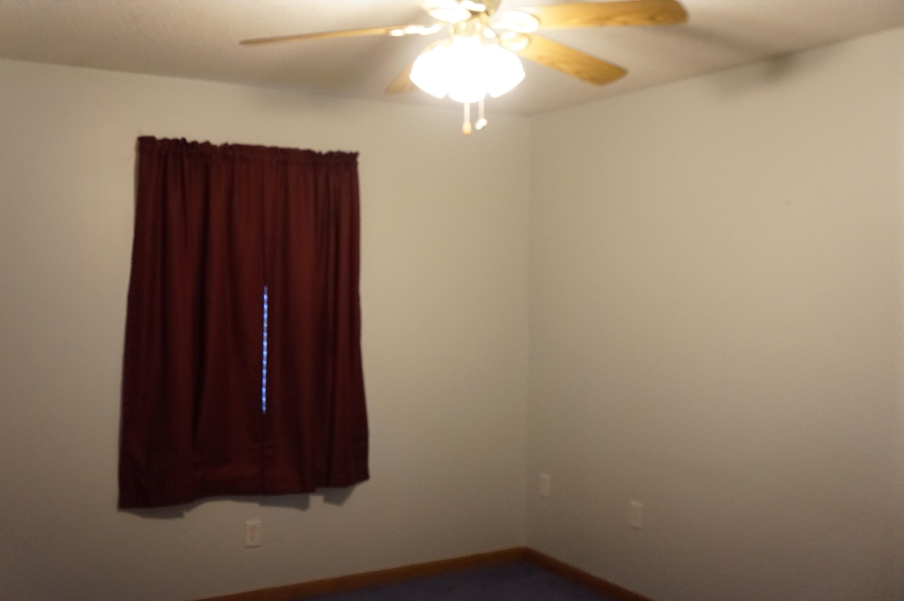 3115 Auburn Road Crestview, FL 32539 - Photo 8 of 25 wooden floor in closet of a house