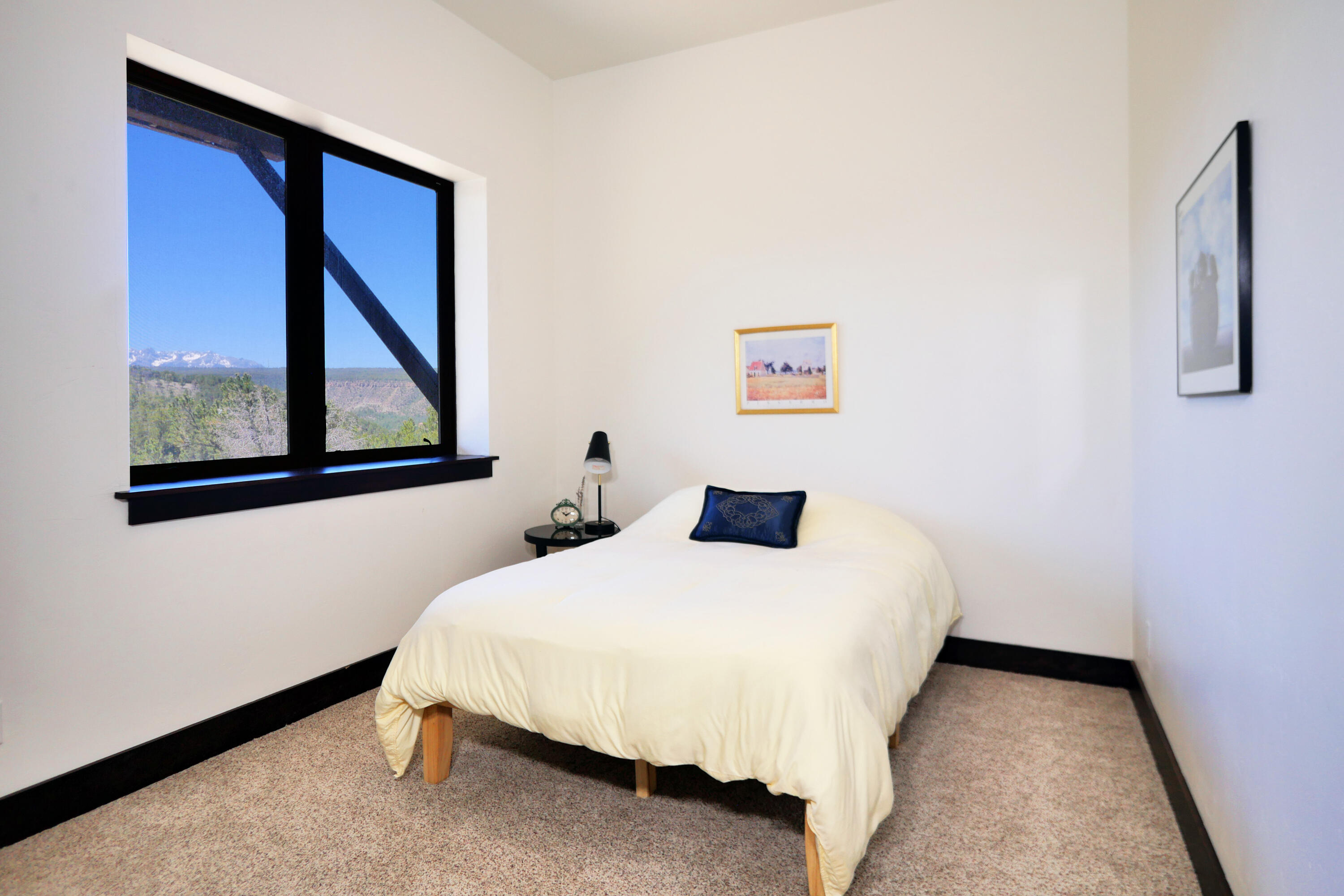 456 Ridge Road Montrose, CO 81403 - Photo 13 of 23 11 - Guest Bedroom -- Mountain Window