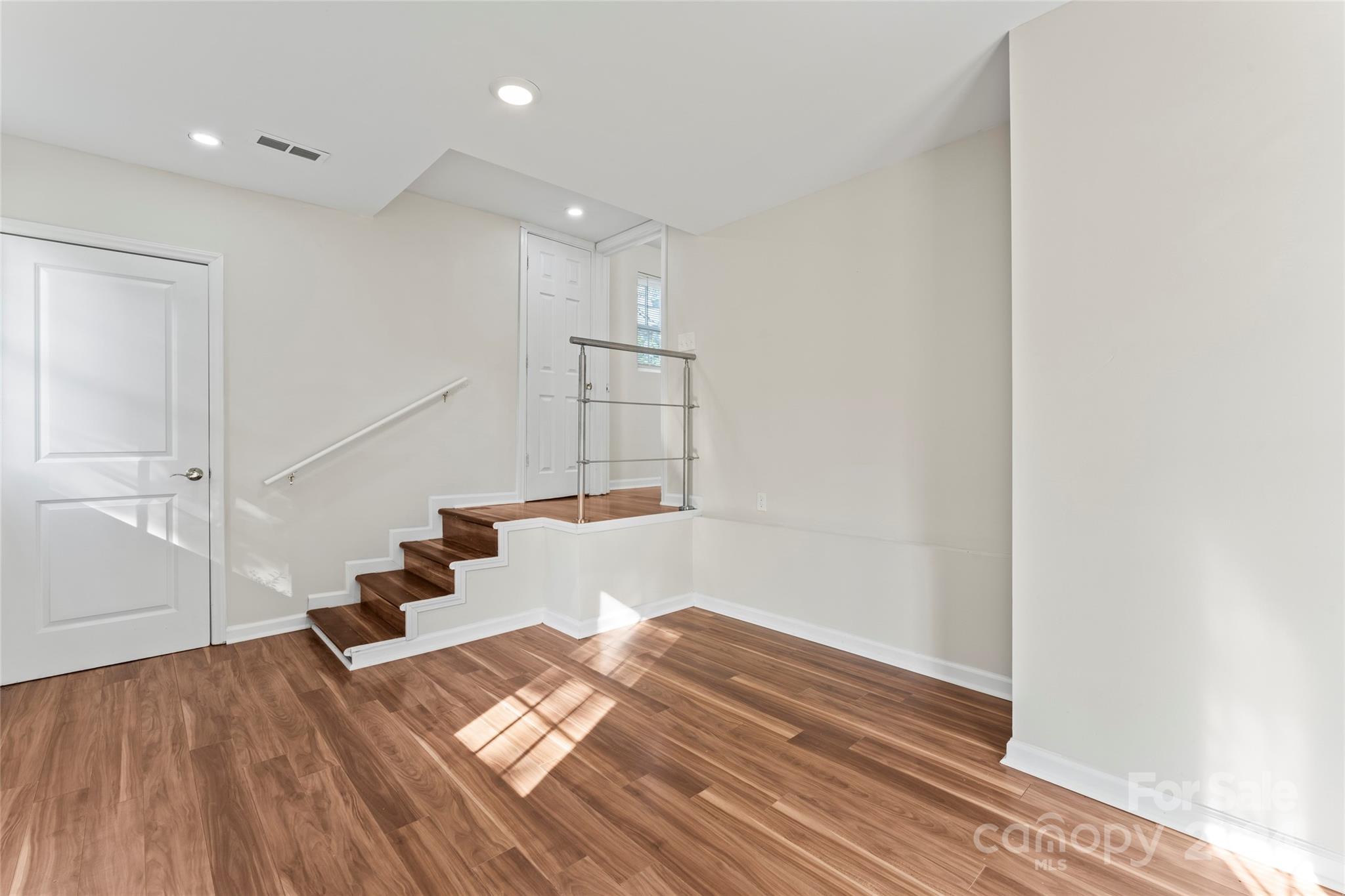 1731 Flat Creek Road Lancaster, SC 29720 - Photo 23 of 40 a view of entryway and hall with wooden floor