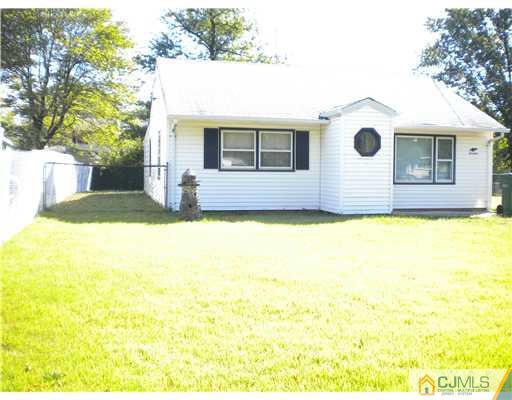 13 Miko Road Edison, NJ 08817 - Photo 1 of 1 a front view of a house with yard