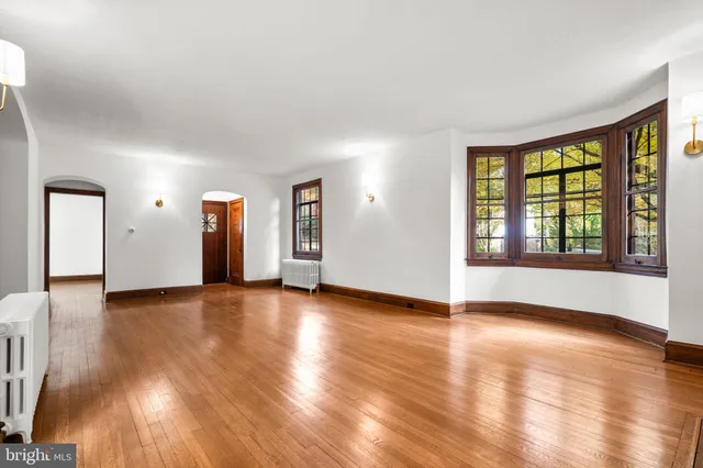 a view of a room with a large window