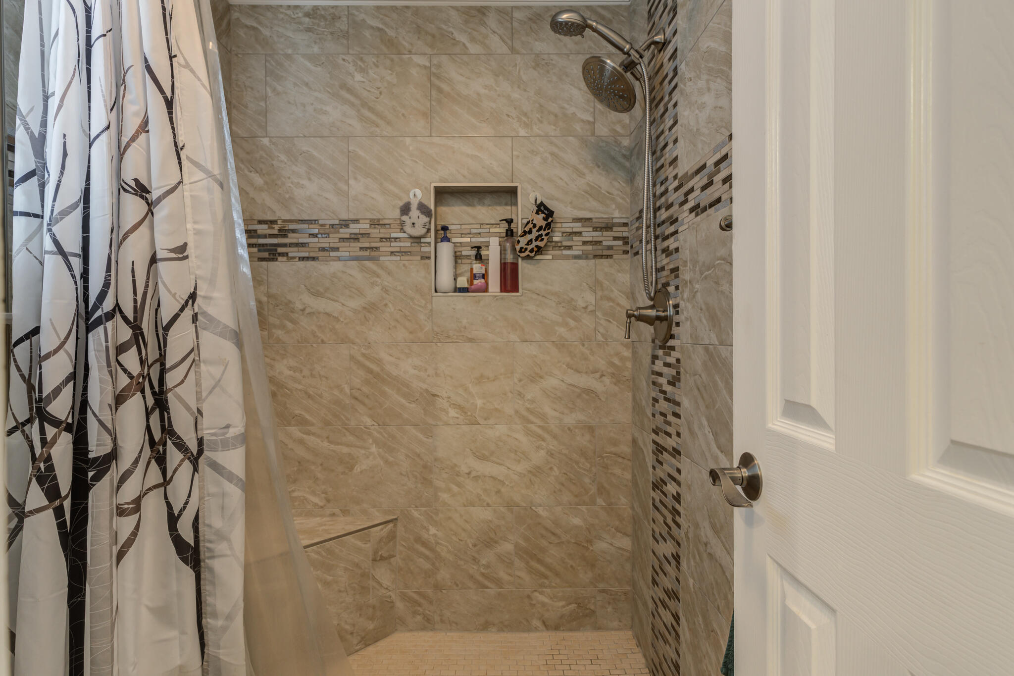 2608 74th Place Lubbock, TX 79423 - Photo 23 of 38 a bathroom with a shower