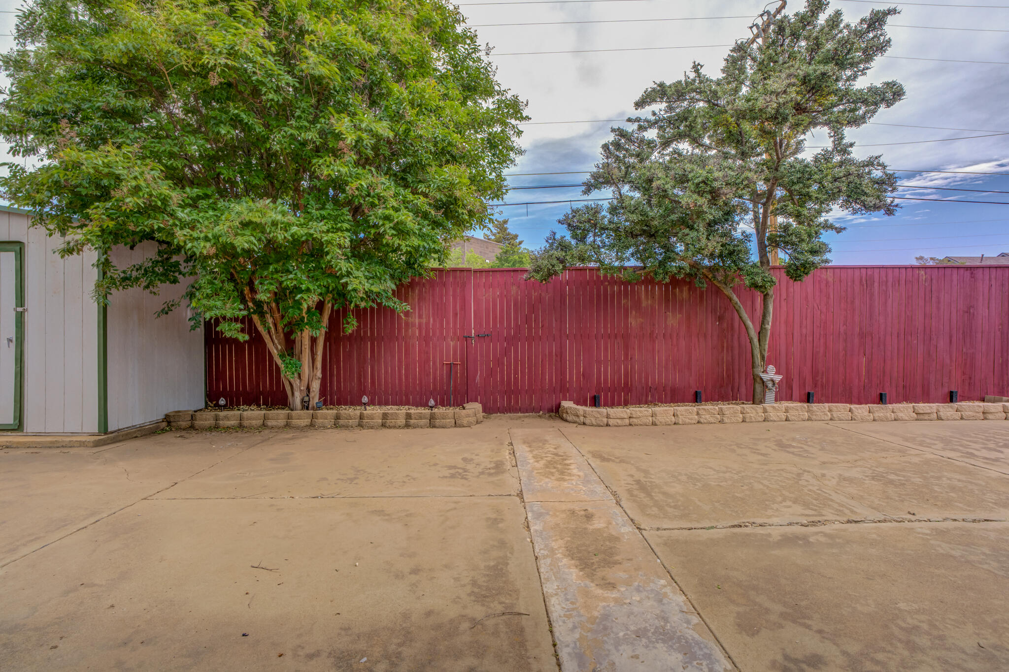 2608 74th Place Lubbock, TX 79423 - Photo 36 of 38 a view of an outdoor space with wooden fence
