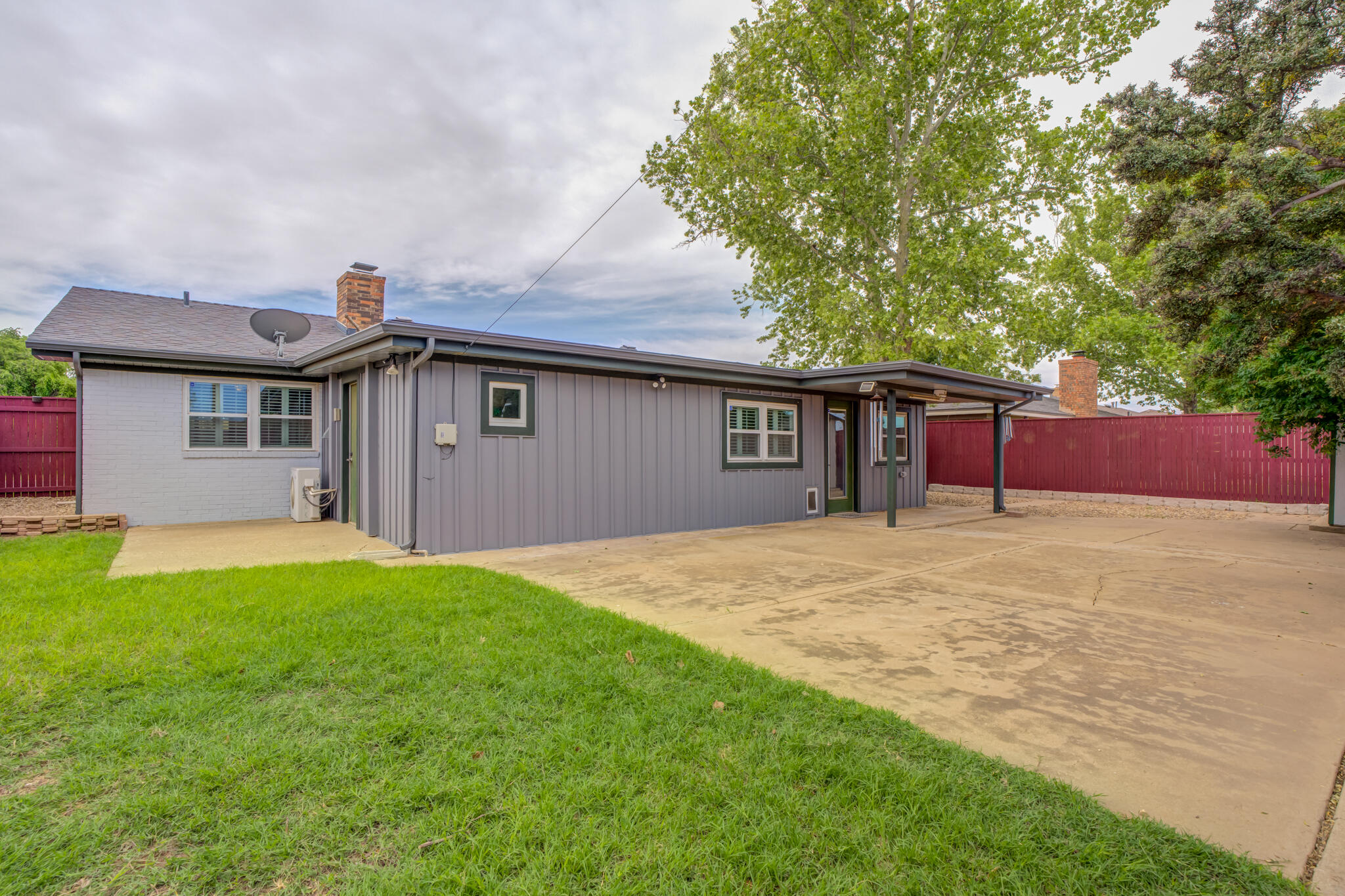 2608 74th Place Lubbock, TX 79423 - Photo 5 of 38 a house view with a backyard space