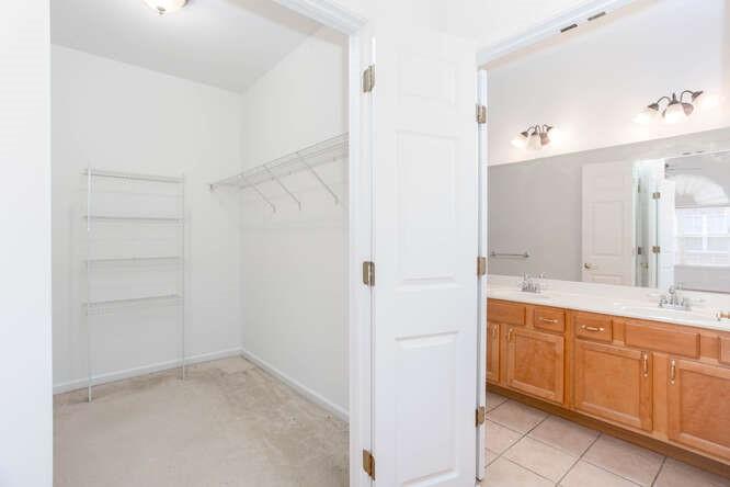 3402 Raes Creek Road, Unit 27 Marietta, GA 30008 - Photo 19 of 32 a bathroom with a sink and a mirror