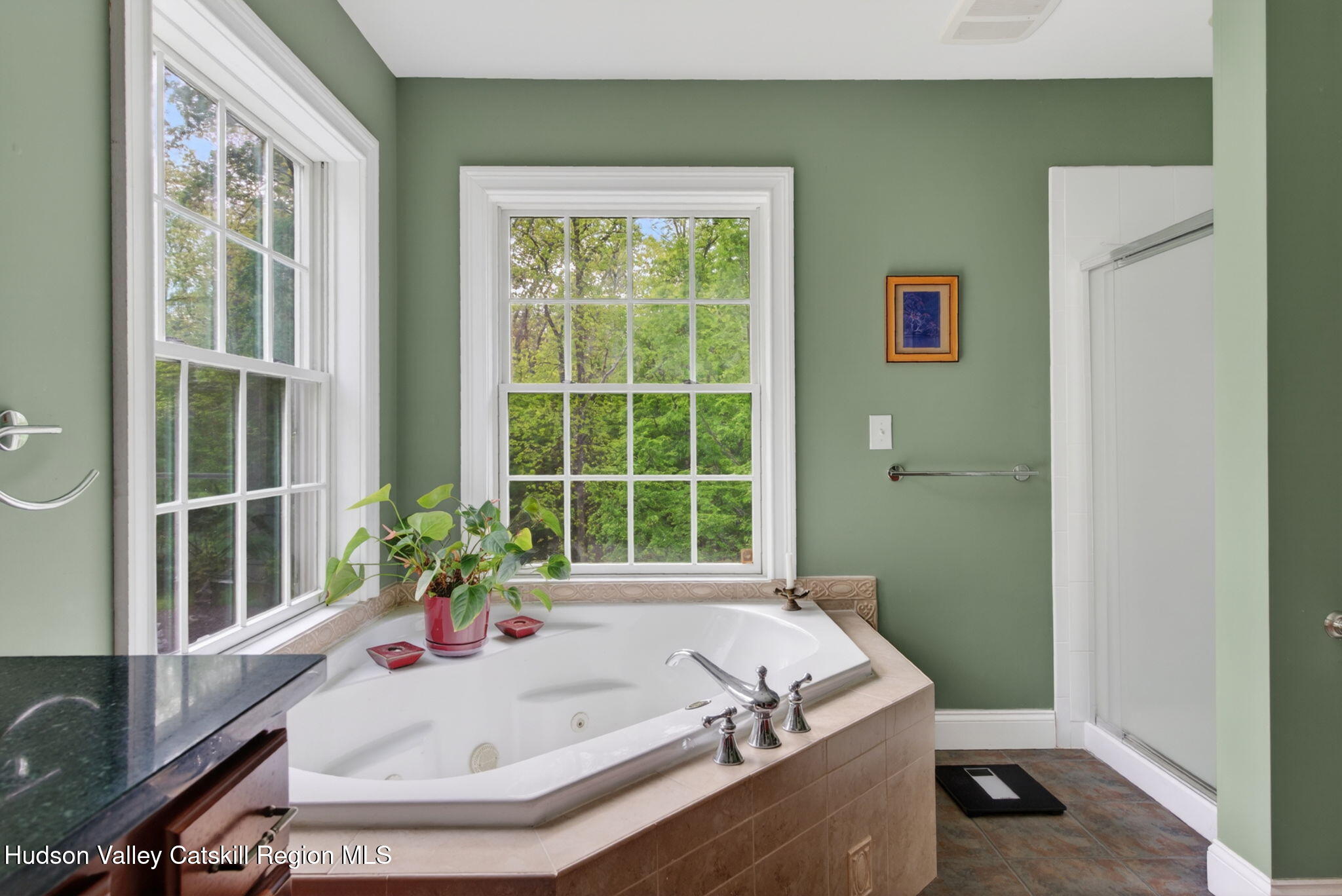 189 Bush Road Stone Ridge, NY 12484 - Photo 23 of 60 a bath tub sitting in a bathroom next to a window