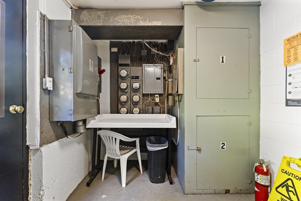 1 Colonial Drive, Unit C16 Andover, MA 01810 - Photo 28 of 32 a dining room with furniture and window
