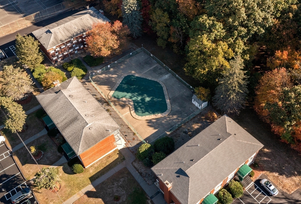 1 Colonial Drive, Unit C16 Andover, MA 01810 - Photo 31 of 32 an aerial view of a house with a yard and potted plants