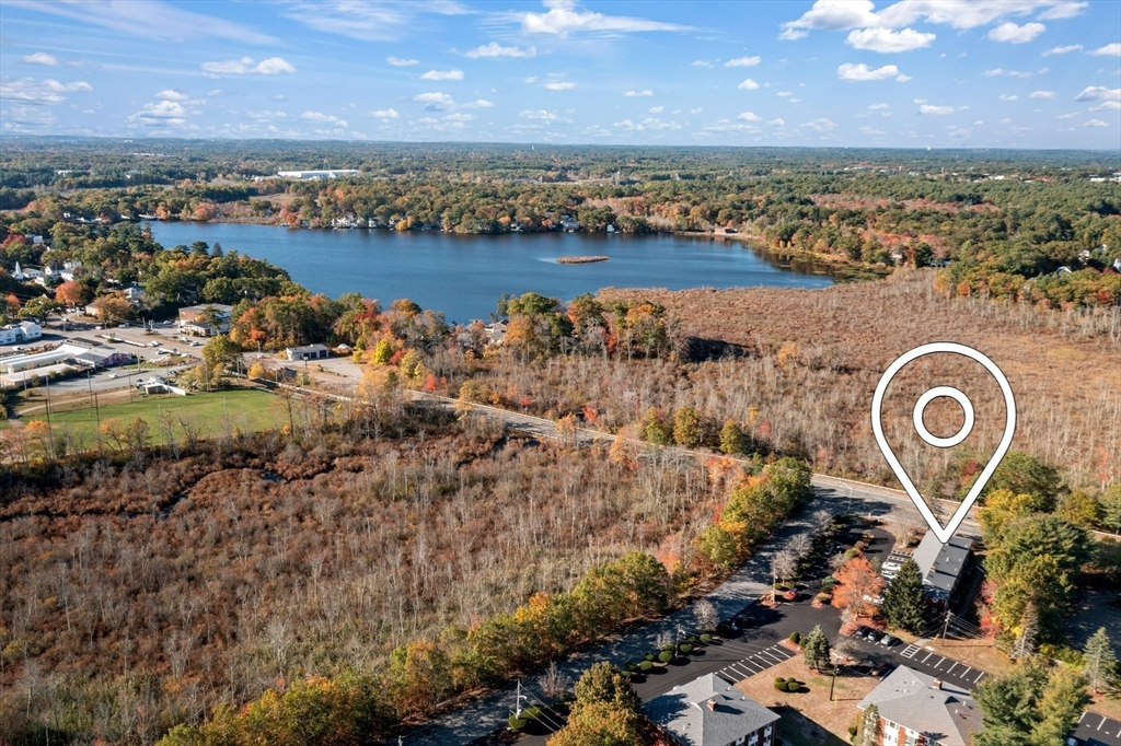1 Colonial Drive, Unit C16 Andover, MA 01810 - Photo 32 of 32 an aerial view of a house with a lake view