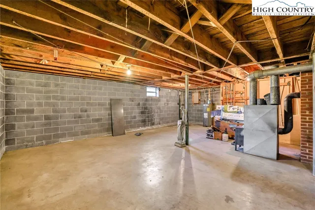 a view of yard with swimming pool and green space