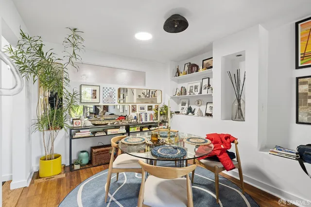 a view of a workspace with furniture and toys