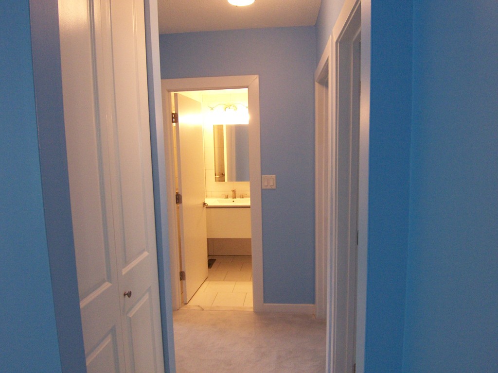 140 Lake Shore Road, Unit 1 Boston, MA 02135 - Photo 8 of 26 a view of a bathroom from a hallway