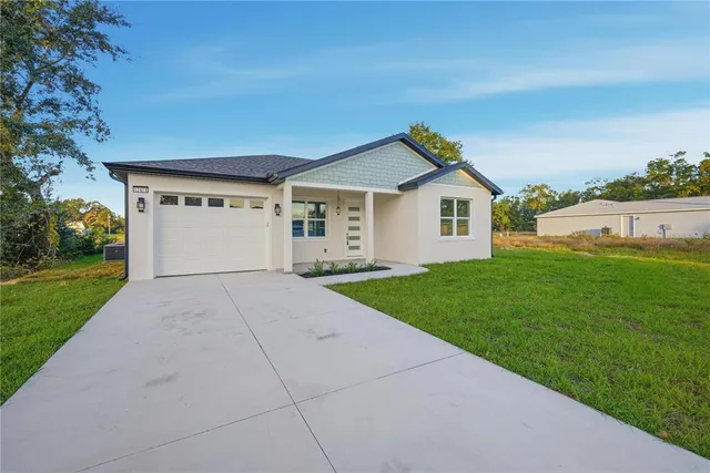 a view of outdoor space yard and garage