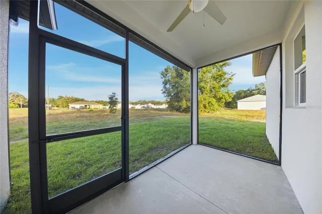 a view of a porch and garden
