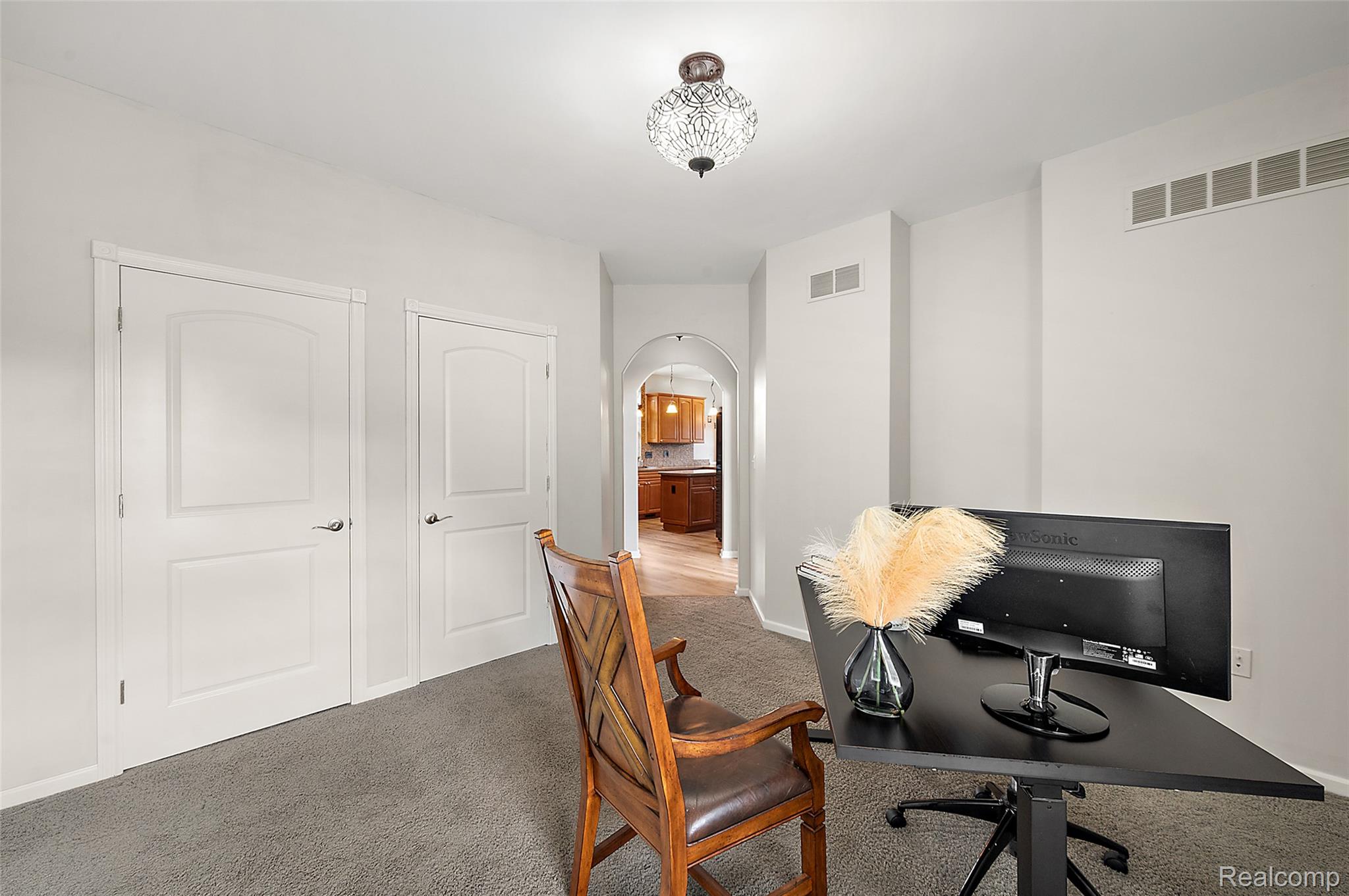 5035 Hidden Ridge Road Metamora, MI 48455 - Photo 14 of 65 Carpeted room with white walls and a crystal-style ceiling fixture
