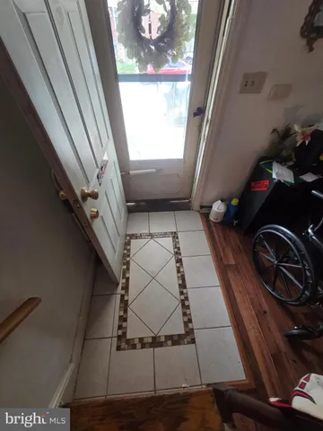 a view of a backyard with sitting area