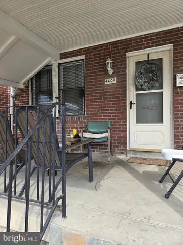 a bathroom with a granite countertop sink and a stove