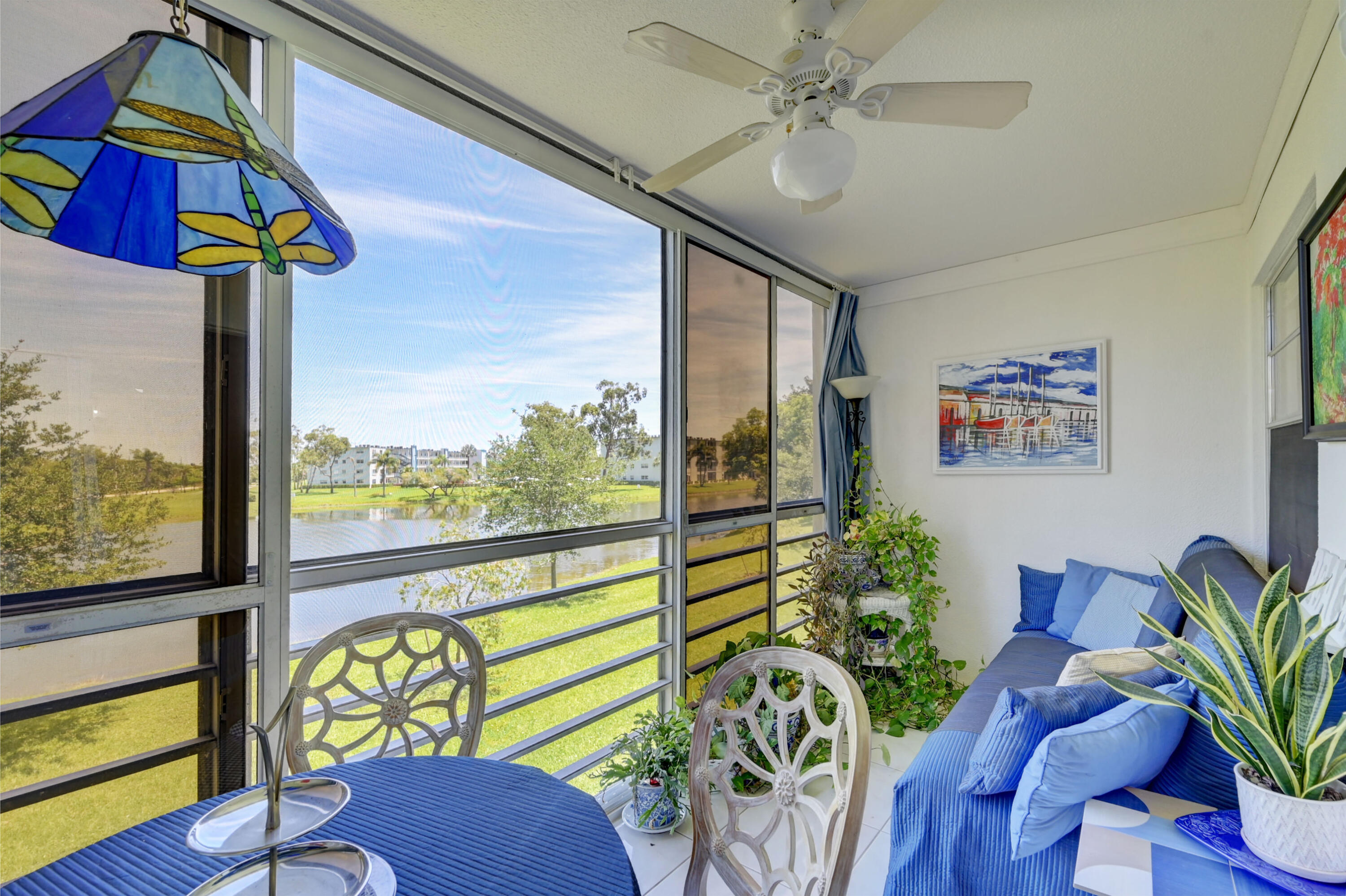 2049 Newcastle A, Unit 2049 Boca Raton, FL 33434 - Photo 2 of 24 a building outdoor space with furniture