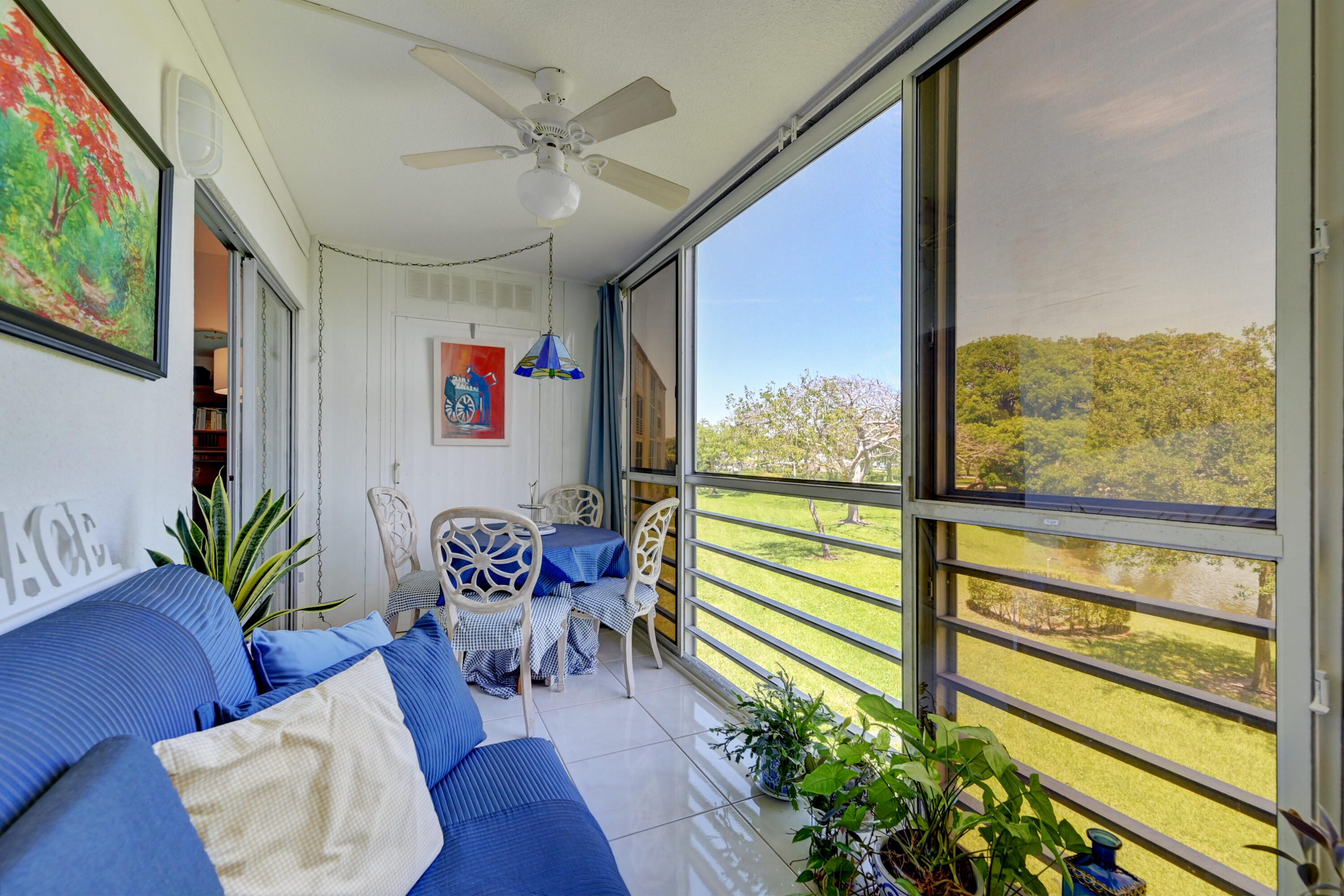 2049 Newcastle A, Unit 2049 Boca Raton, FL 33434 - Photo 3 of 24 a outdoor living space with furniture