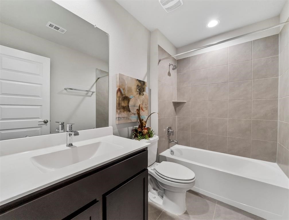 7922 Brumbly Lane Rosharon, TX 77583 - Photo 16 of 17 a bathroom with a sink a toilet and shower