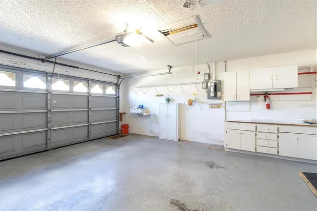 a view of a kitchen with cabinet and a window