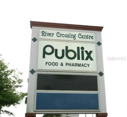 a view of a street with shops