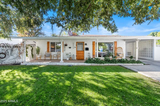front view of a house with a yard
