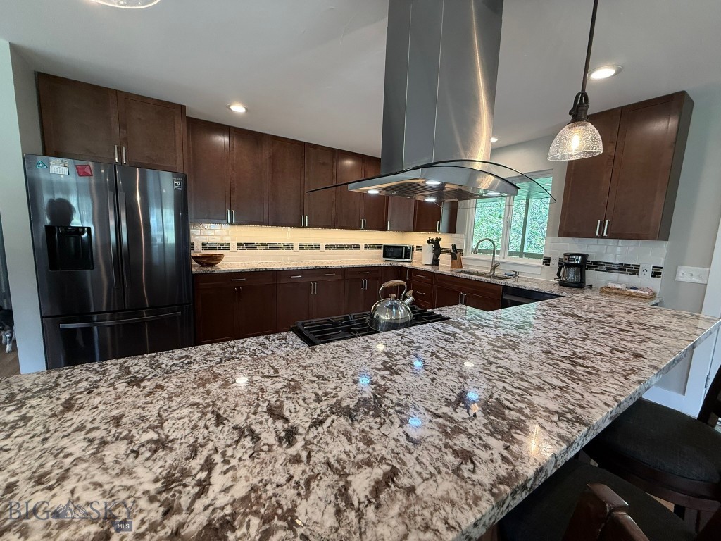 11 Greyson Creek Road Townsend, MT 59644 - Photo 12 of 50 Kitchen island seats four - perfect for entertaining