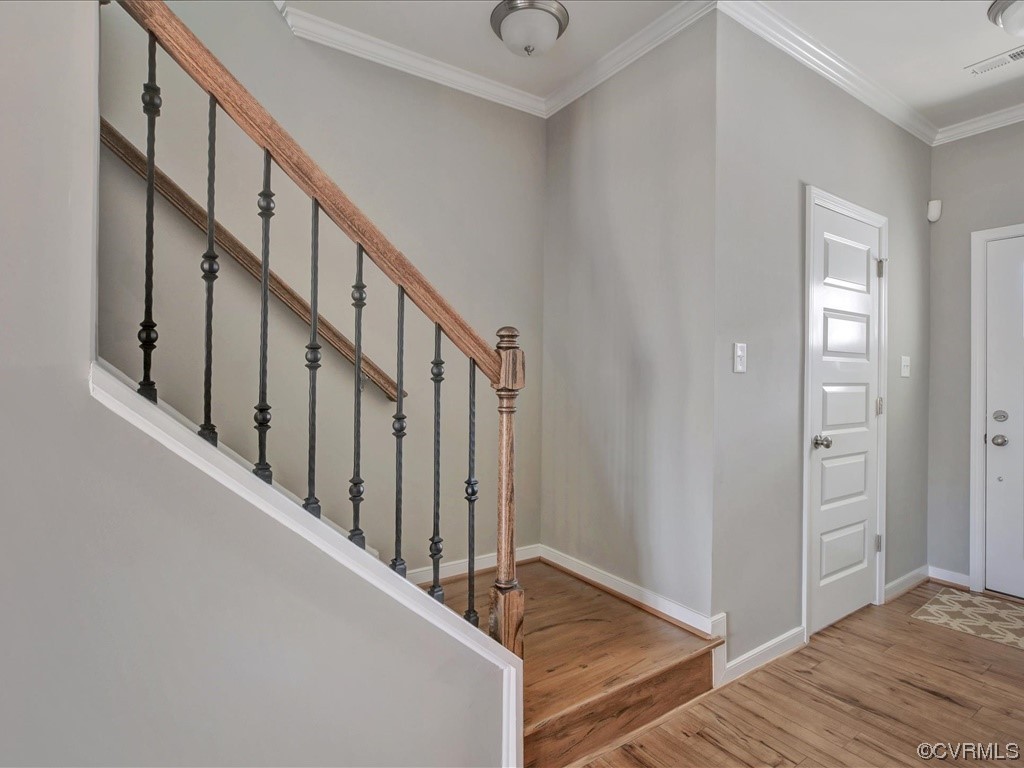 12824 Deep Wl Road Midlothian, VA 23112 - Photo 3 of 44 a view of an entryway with wooden floor