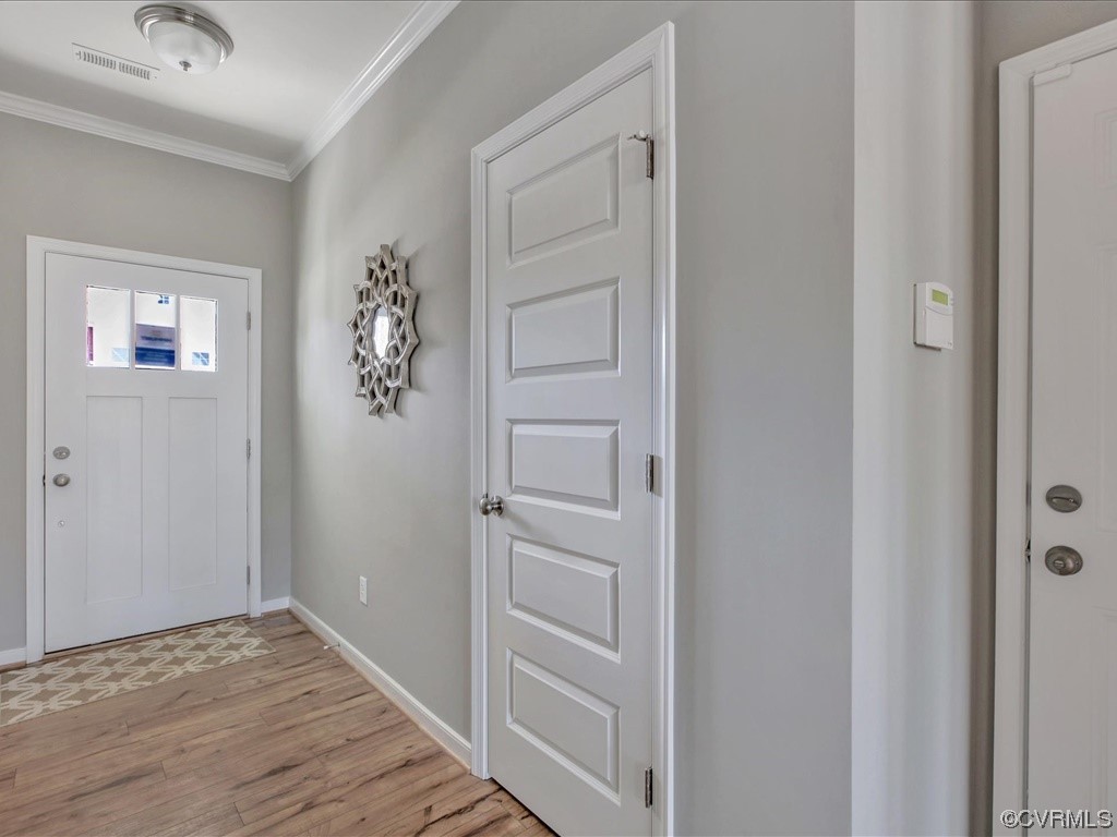 12824 Deep Wl Road Midlothian, VA 23112 - Photo 4 of 44 a view of an entryway with wooden floor