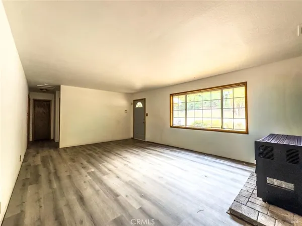 a large bathroom with a large tub and sink