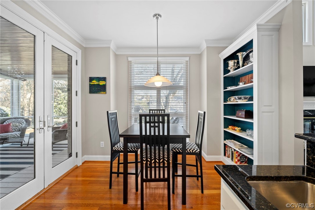 2 Tow Path Circle Richmond, VA 23221 - Photo 12 of 32 a view of a dining room with furniture window and wooden floor