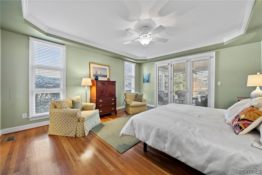 2 Tow Path Circle Richmond, VA 23221 - Photo 16 of 32 a spacious bedroom with a bed and a couch