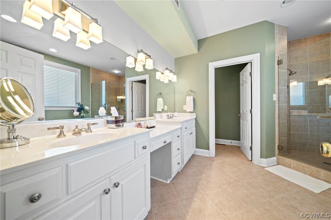 2 Tow Path Circle Richmond, VA 23221 - Photo 17 of 32 a spacious bathroom with a granite countertop sink mirror and shower