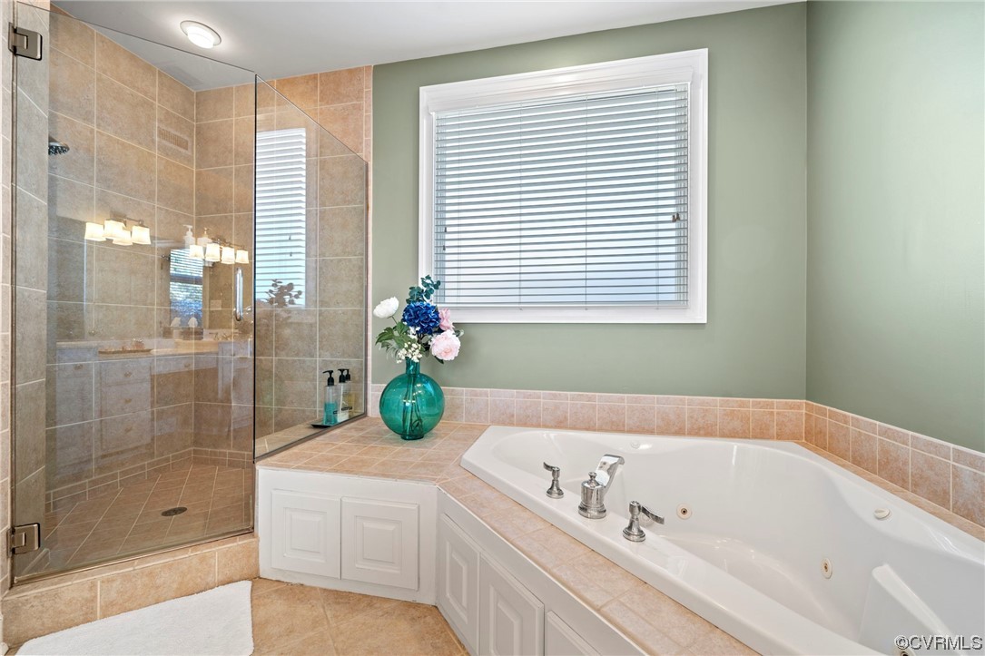 2 Tow Path Circle Richmond, VA 23221 - Photo 18 of 32 a bathroom with a tub sink and shower