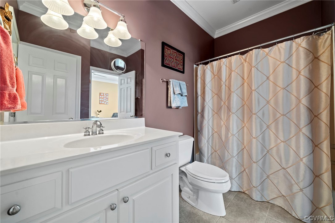 2 Tow Path Circle Richmond, VA 23221 - Photo 21 of 32 a bathroom with a toilet a sink and a mirror