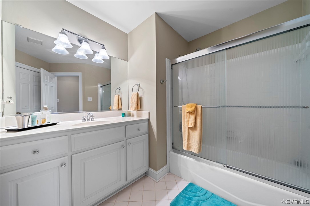 2 Tow Path Circle Richmond, VA 23221 - Photo 24 of 32 a bathroom with a double vanity sink mirror and shower