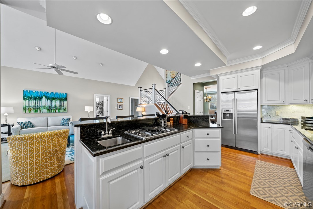 2 Tow Path Circle Richmond, VA 23221 - Photo 7 of 32 a kitchen with stainless steel appliances granite countertop a stove and a refrigerator
