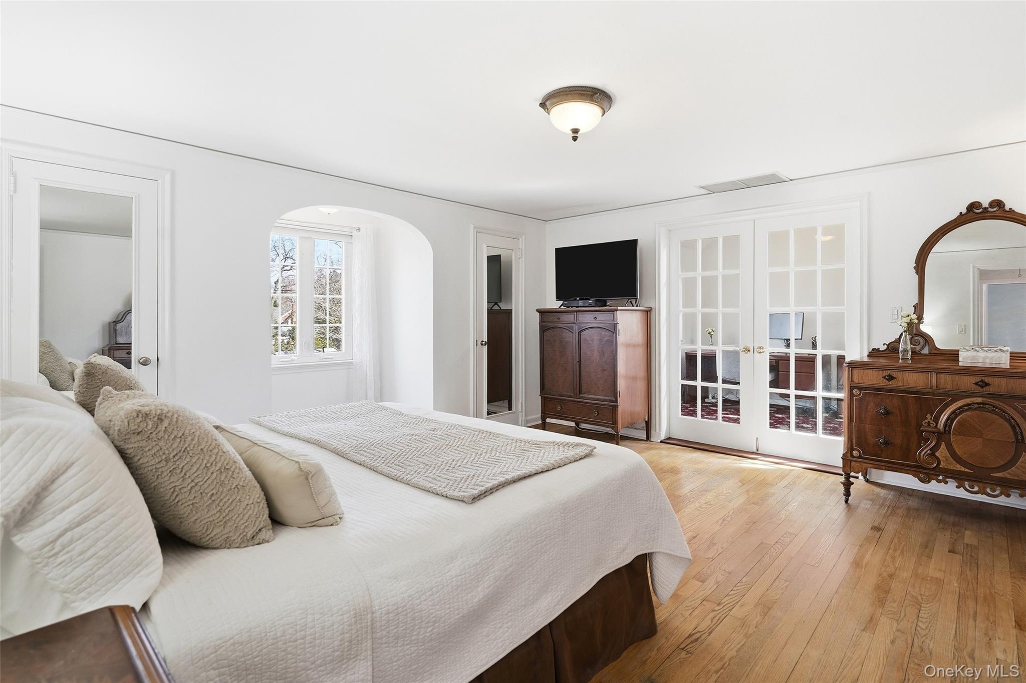 42 Sargent Road Scarsdale, NY 10583 - Photo 15 of 27 Primary bedroom with french doors leading into private home office.