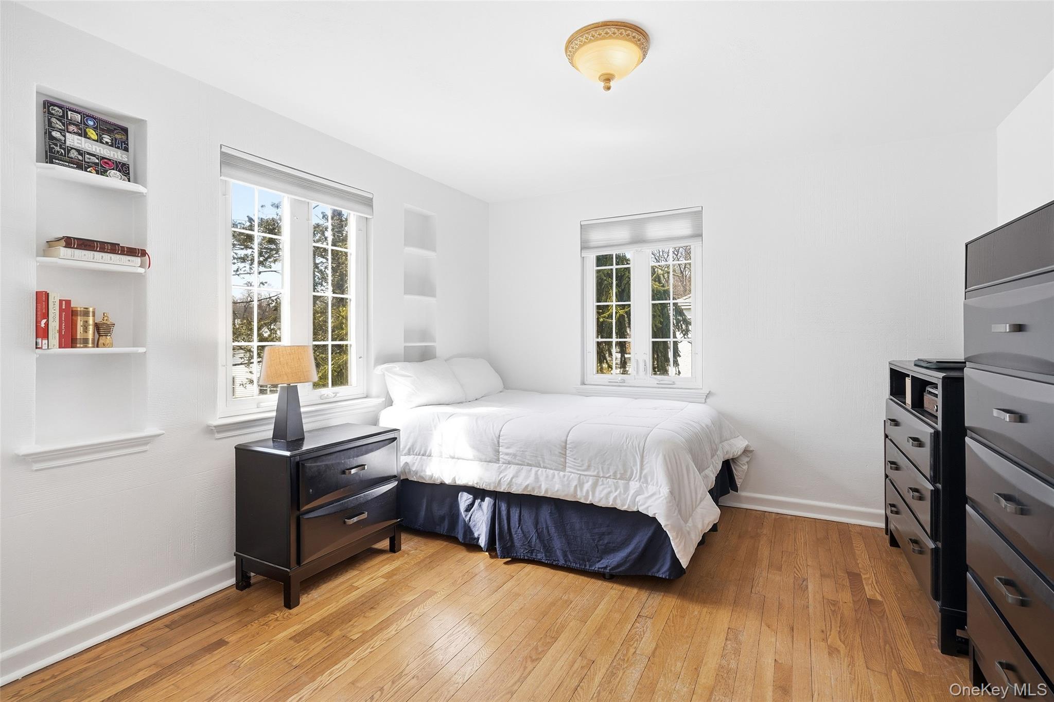 42 Sargent Road Scarsdale, NY 10583 - Photo 20 of 27 Bedroom with hardwood flooring.