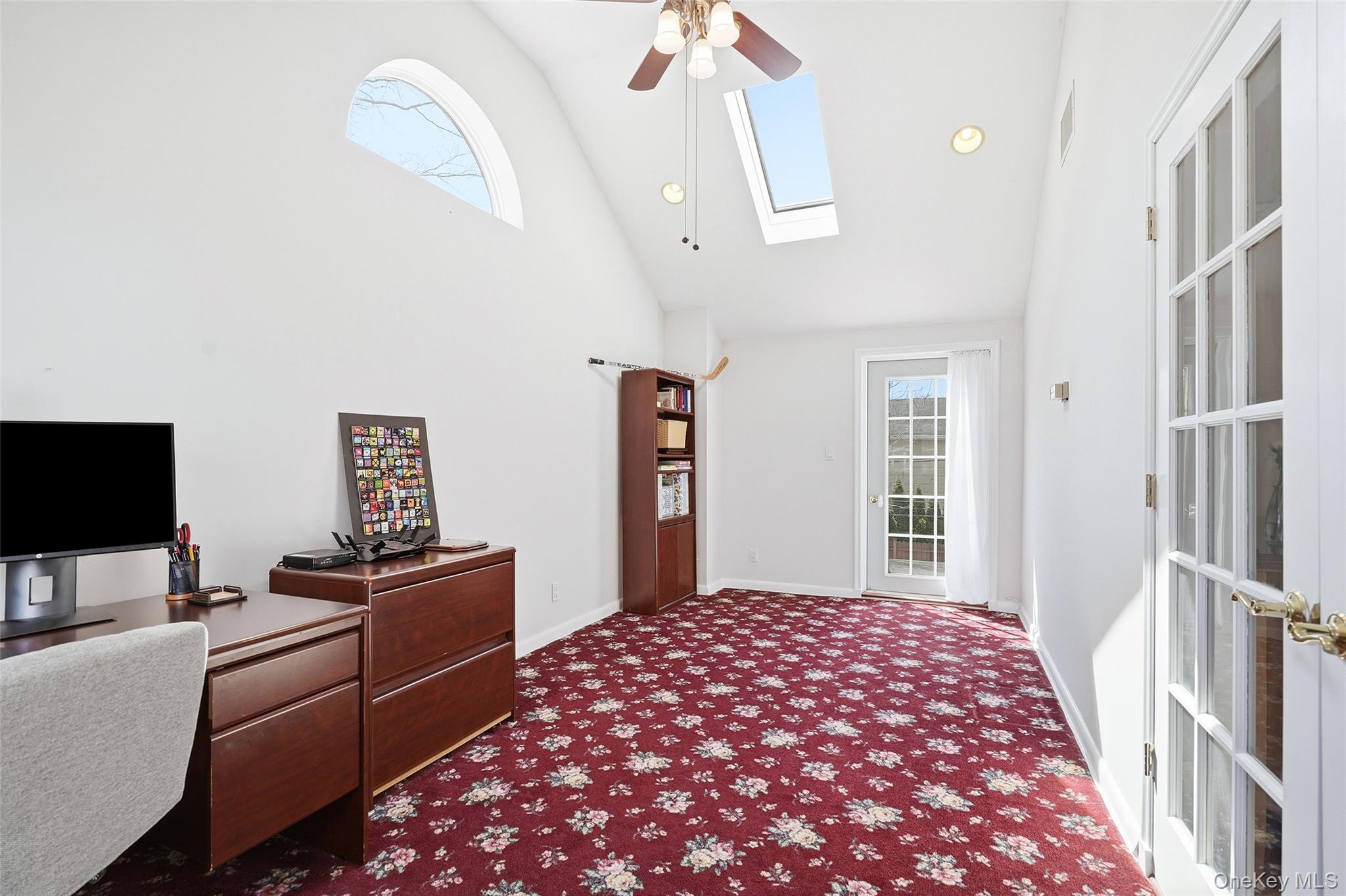 42 Sargent Road Scarsdale, NY 10583 - Photo 22 of 27 Office space with a skylight, a ceiling fan, light carpet, and lofted ceiling.