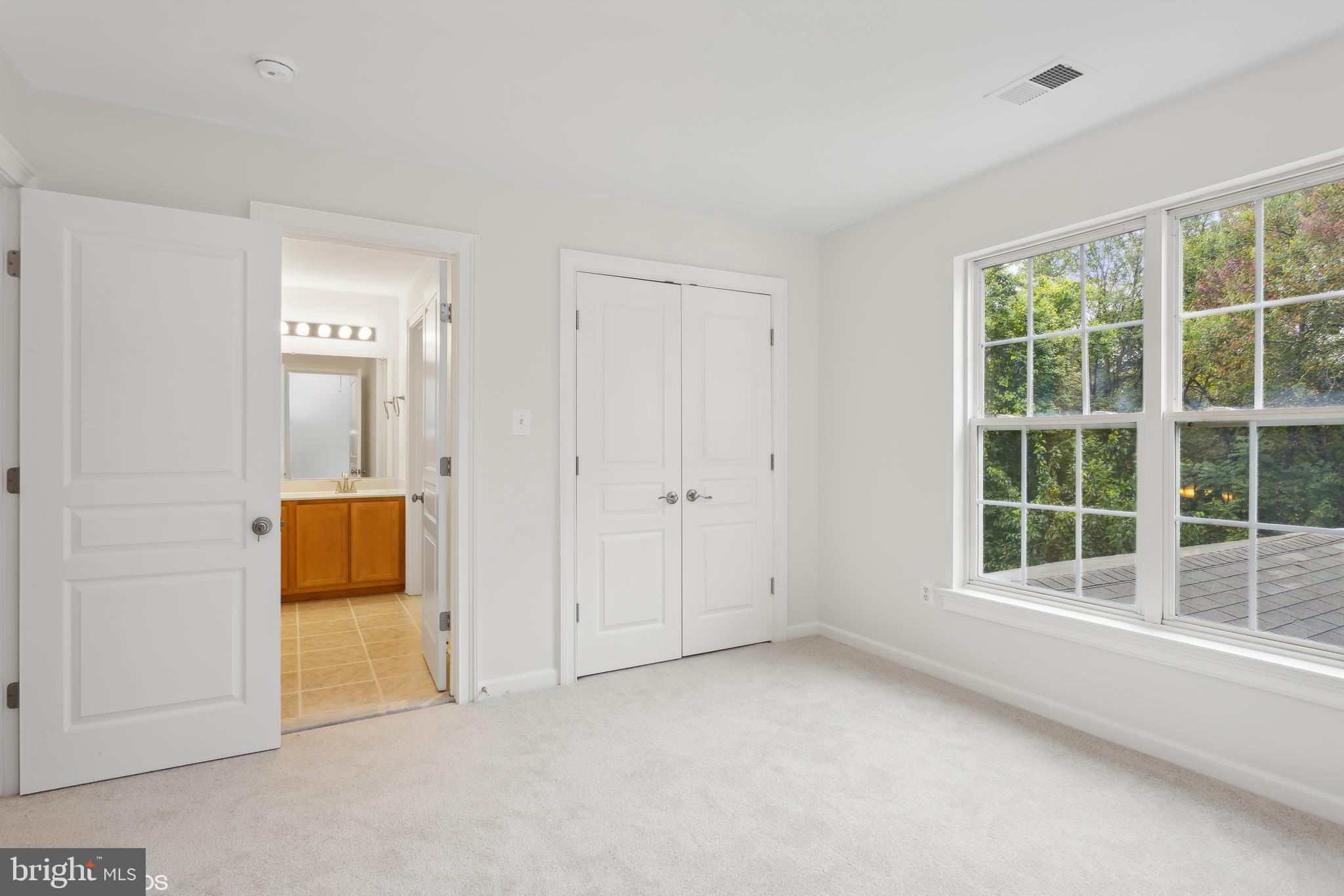818 Hoods Mill Road Cooksville, MD 21723 - Photo 59 of 108 an empty room with a window and a sink
