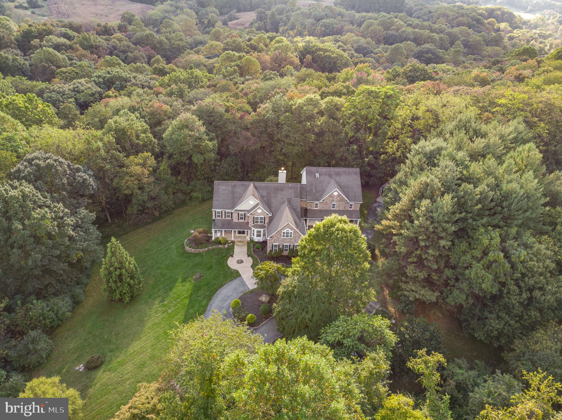 818 Hoods Mill Road Cooksville, MD 21723 - Photo 6 of 108 a aerial view of a house with a yard basket ball court and outdoor seating